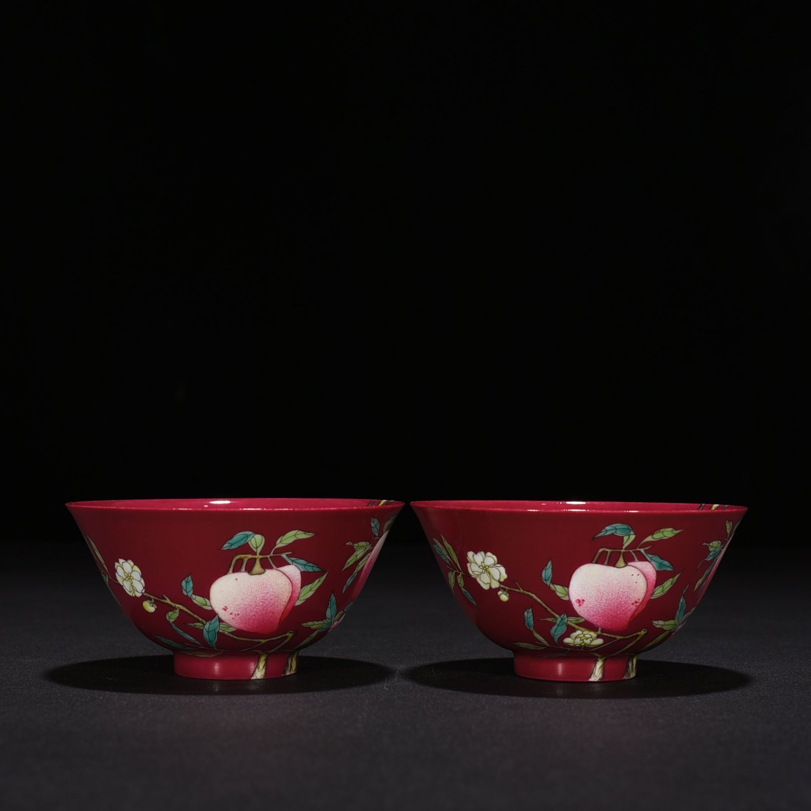 Qing Dynasty Qianlong rouge ground pastel colored cup