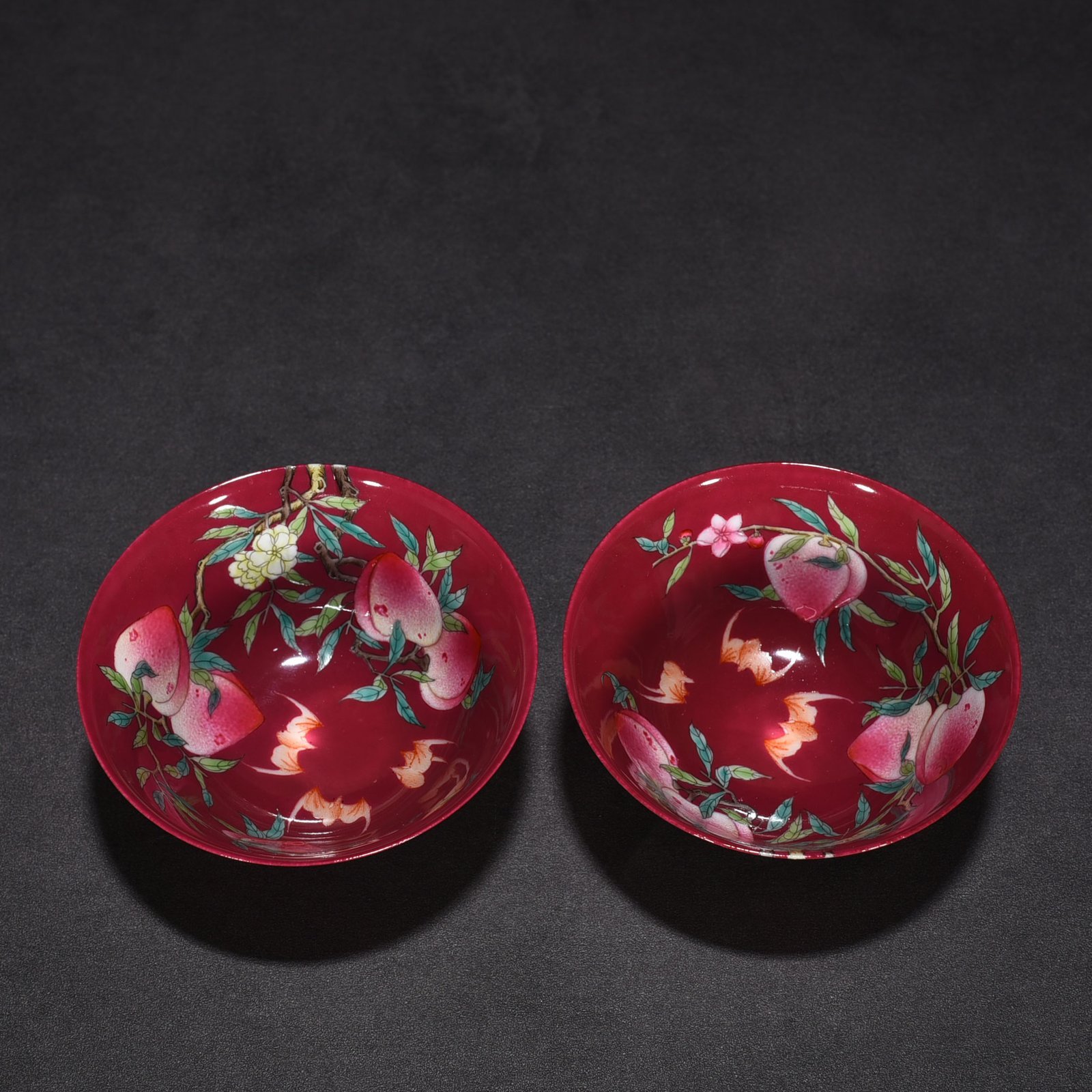 Qing Dynasty Qianlong rouge ground pastel colored cup