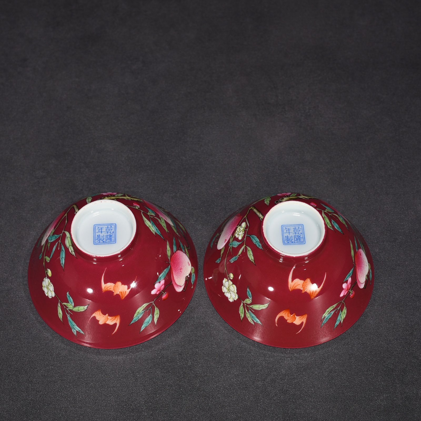 Qing Dynasty Qianlong rouge ground pastel colored cup