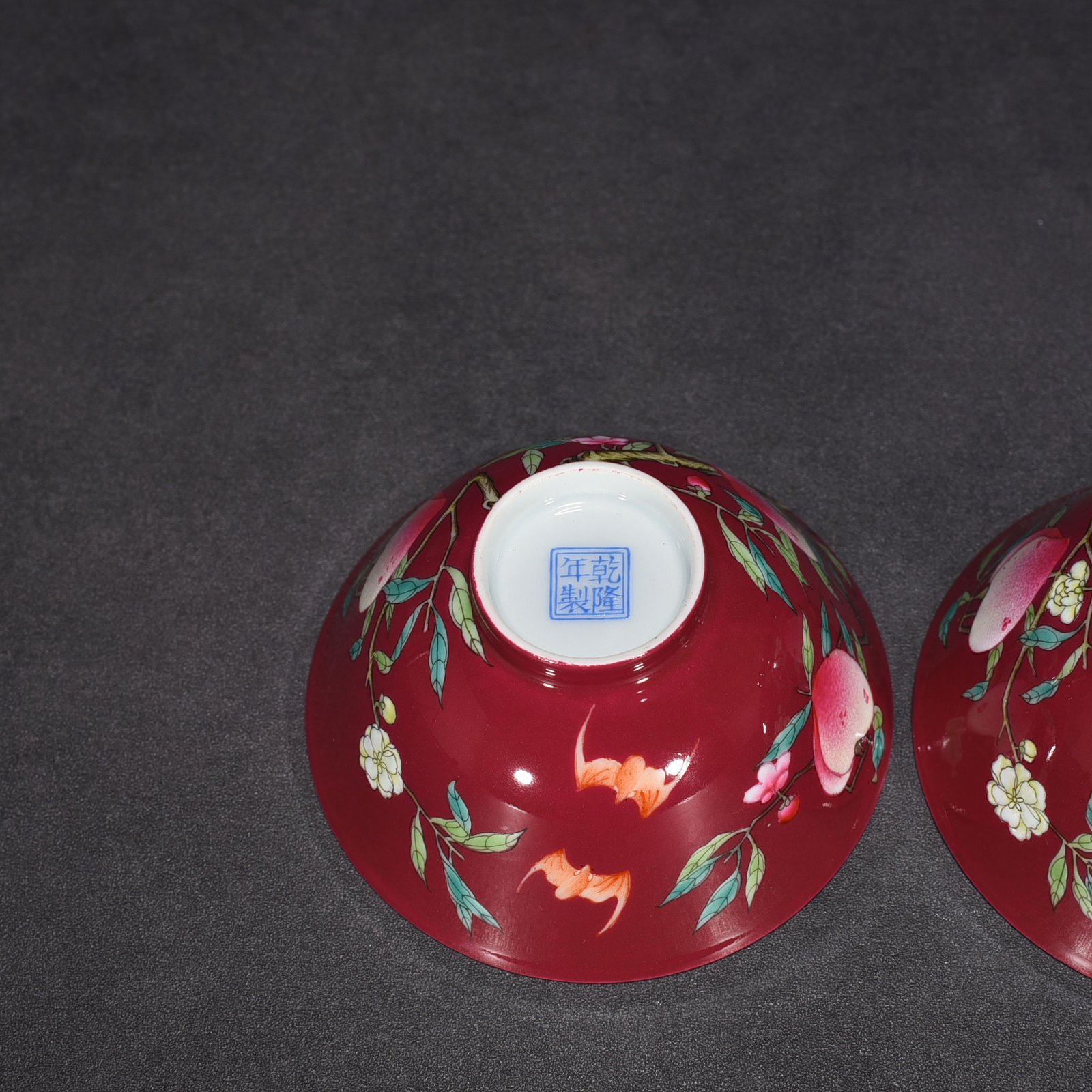 Qing Dynasty Qianlong rouge ground pastel colored cup