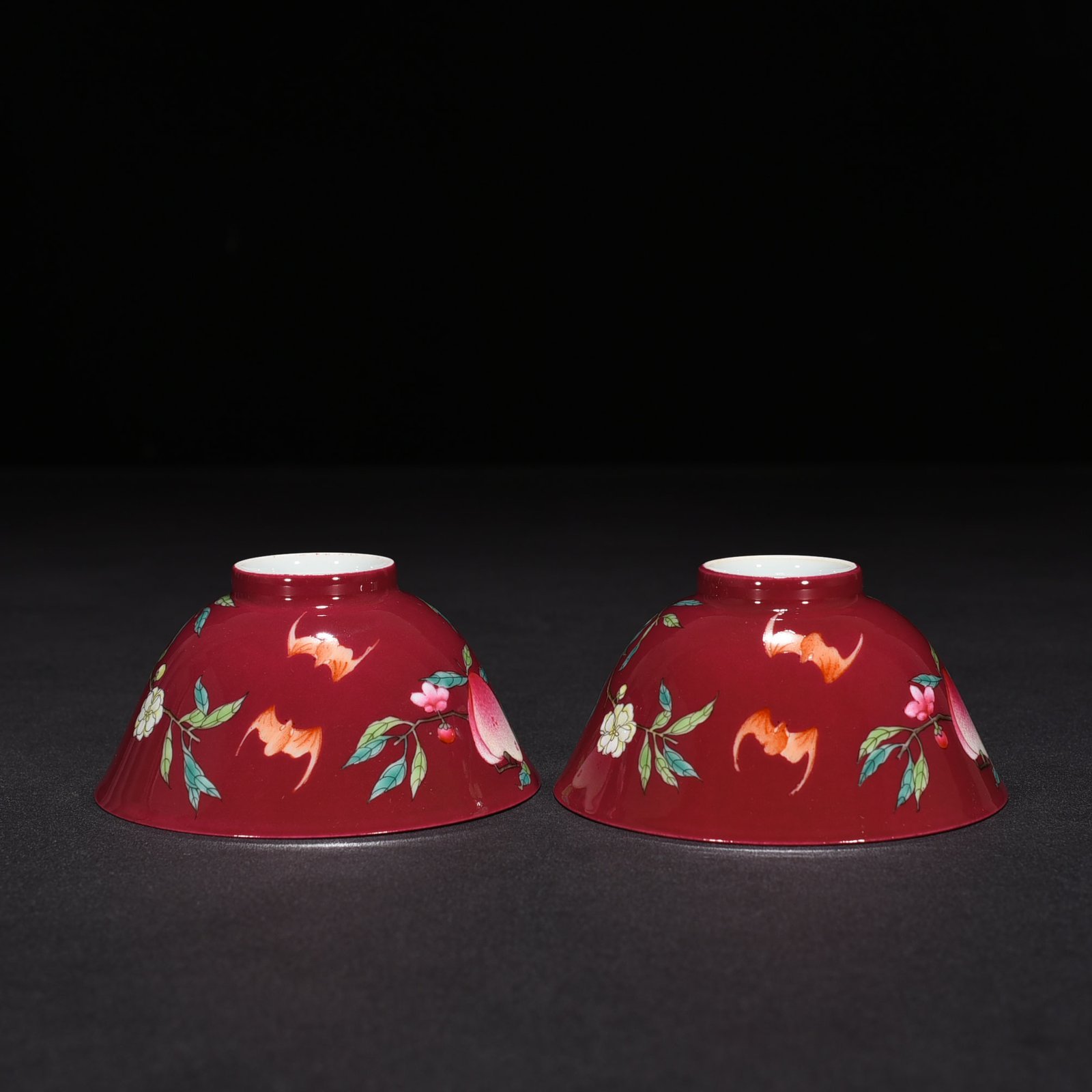 Qing Dynasty Qianlong rouge ground pastel colored cup