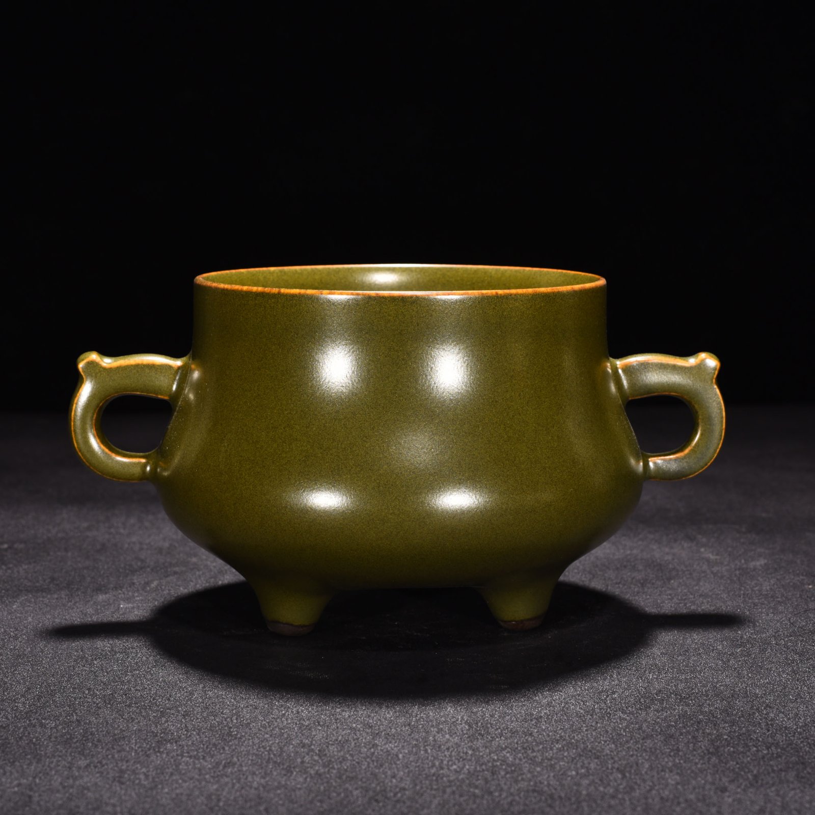 Qing Dynasty Qianlong tea powder-glazed three-legged and double-eared stove
