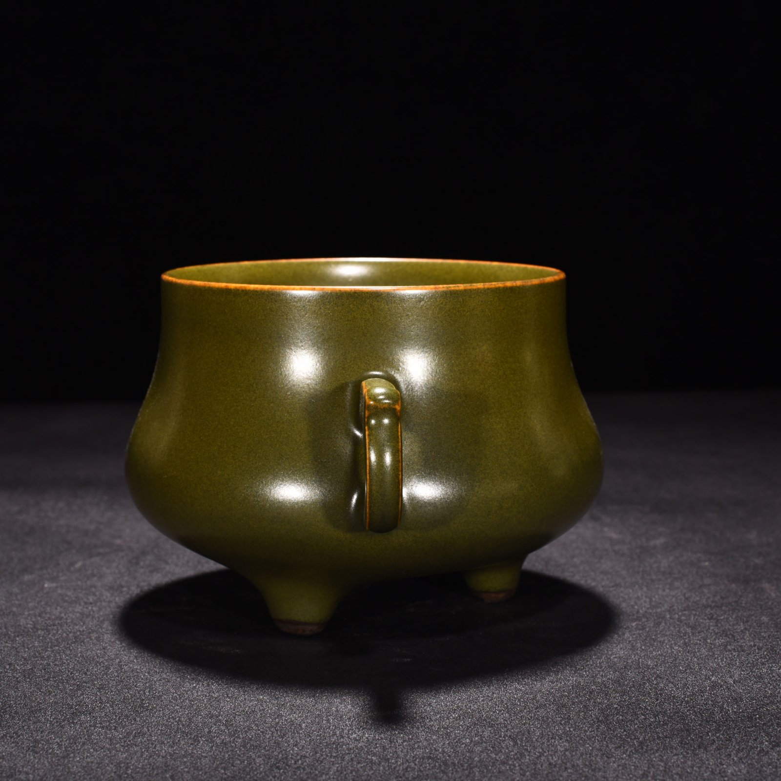 Qing Dynasty Qianlong tea powder-glazed three-legged and double-eared stove