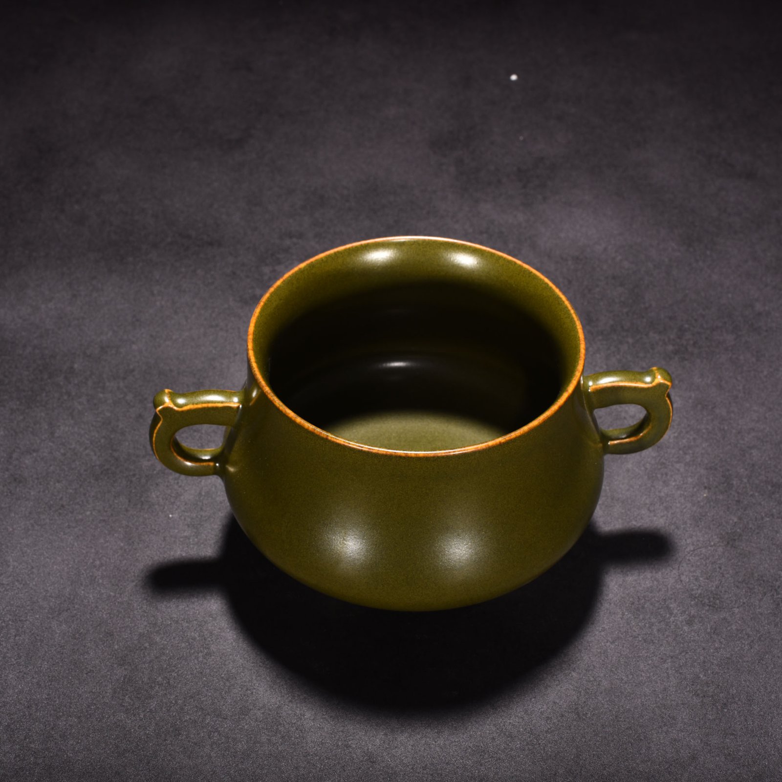 Qing Dynasty Qianlong tea powder-glazed three-legged and double-eared stove