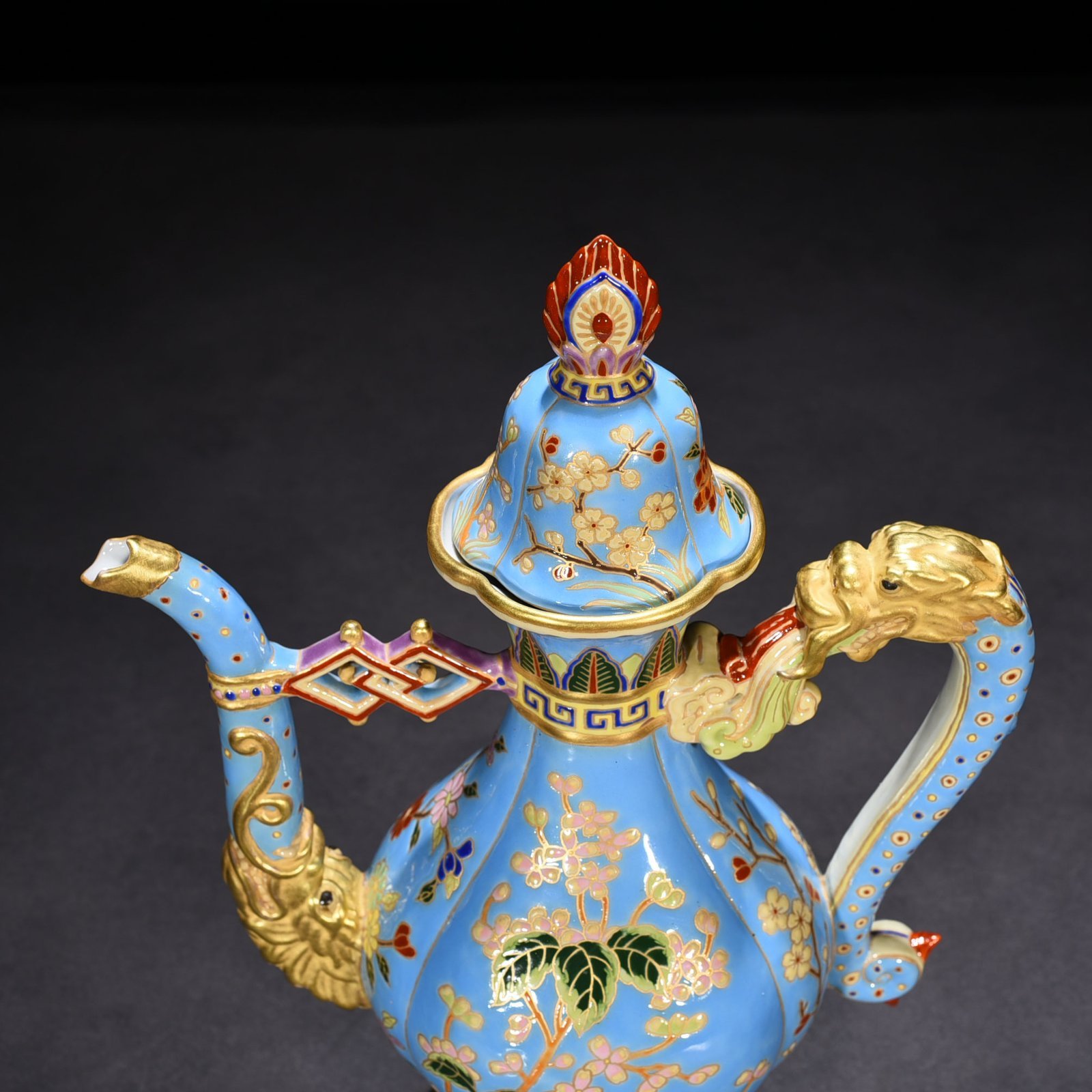 Qing Dynasty Qianlong blue ground enamel teapot with folded branches and floral pot