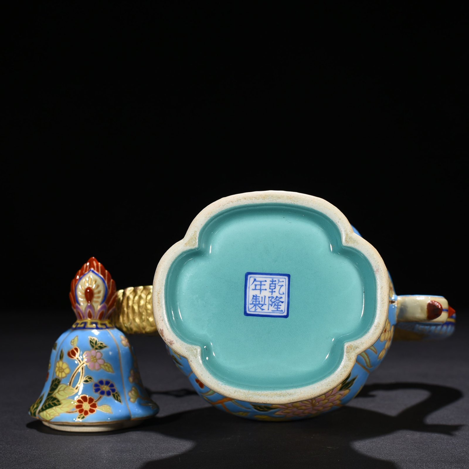 Qing Dynasty Qianlong blue ground enamel teapot with folded branches and floral pot