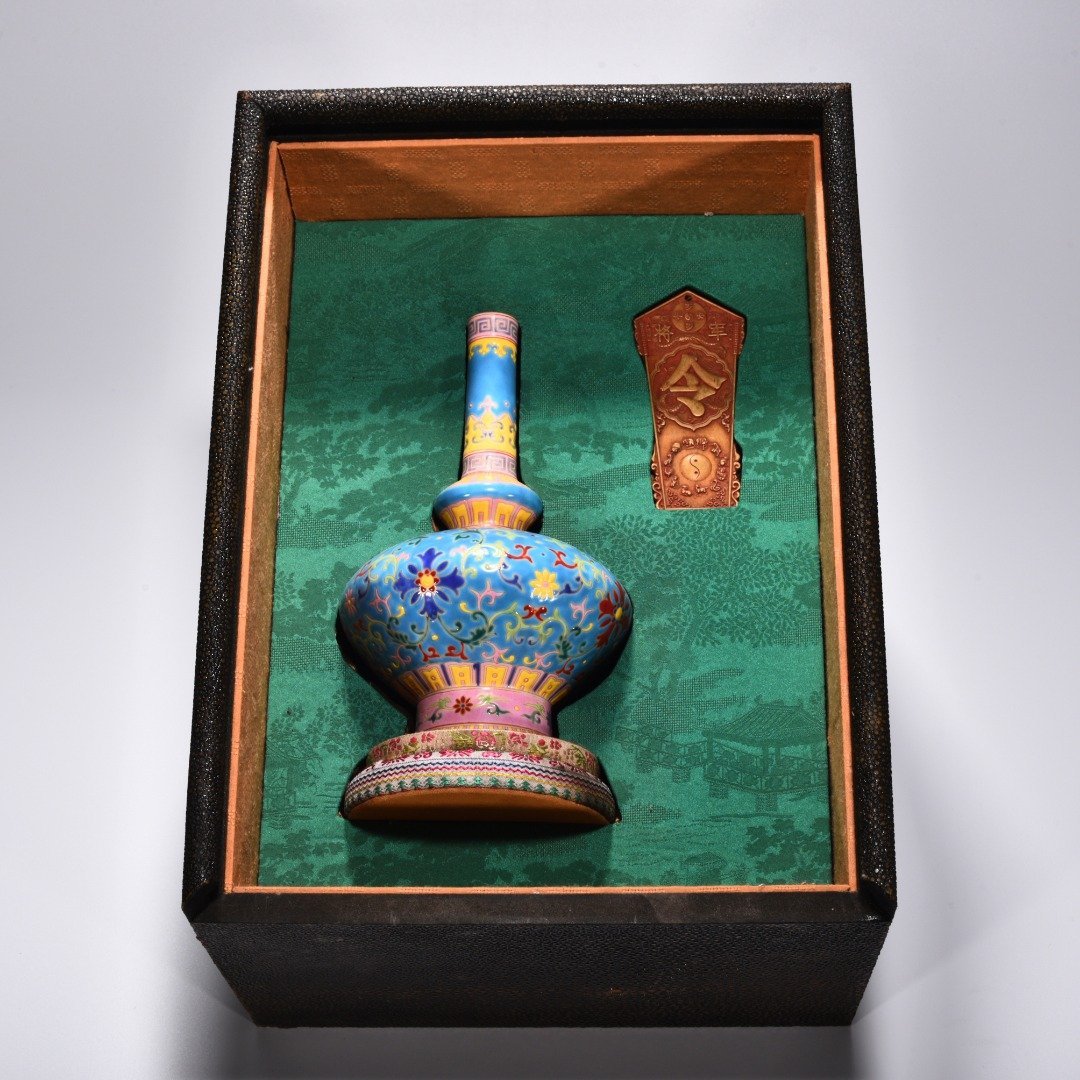 Qing Dynasty Qianlong blue ground enamel vase