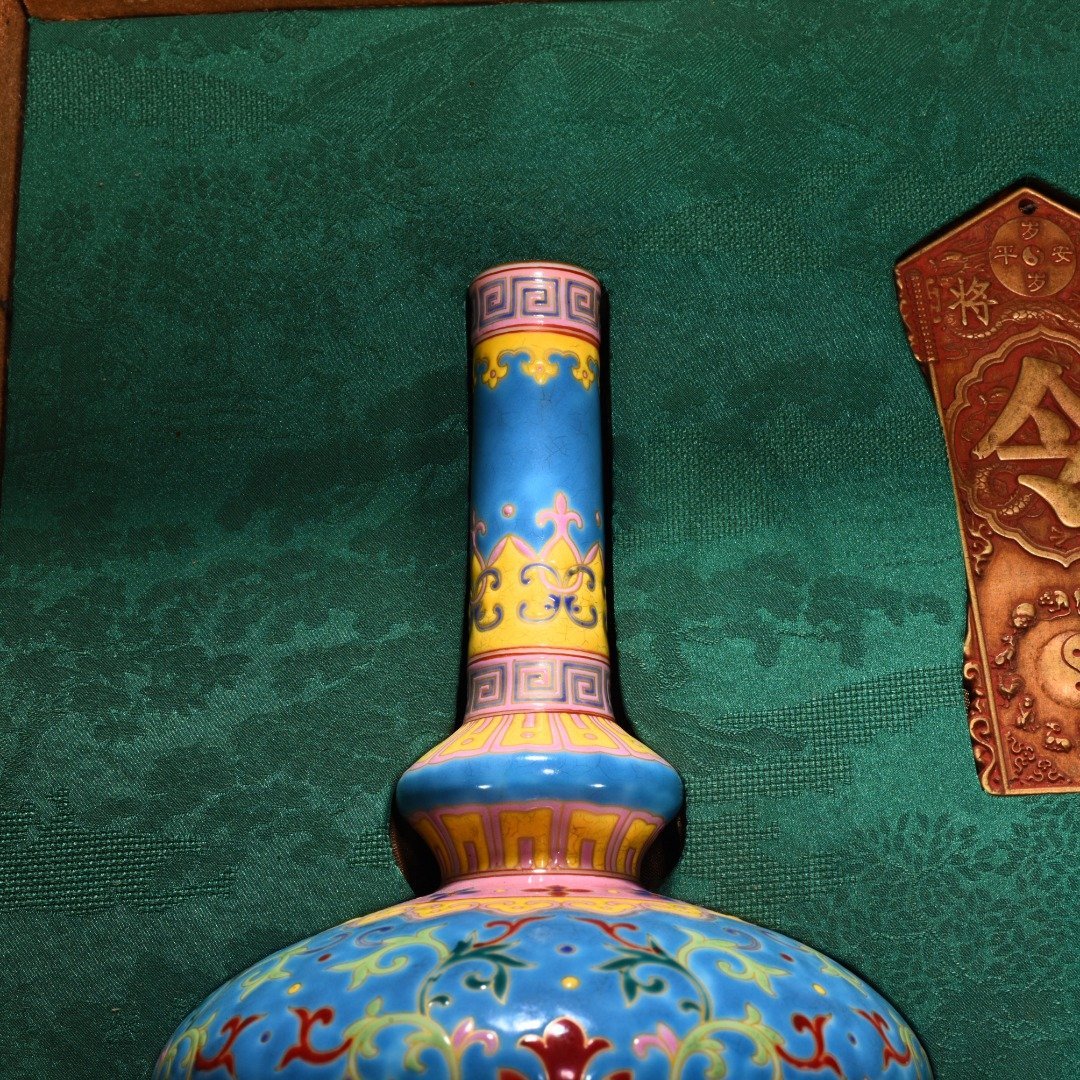 Qing Dynasty Qianlong blue ground enamel vase