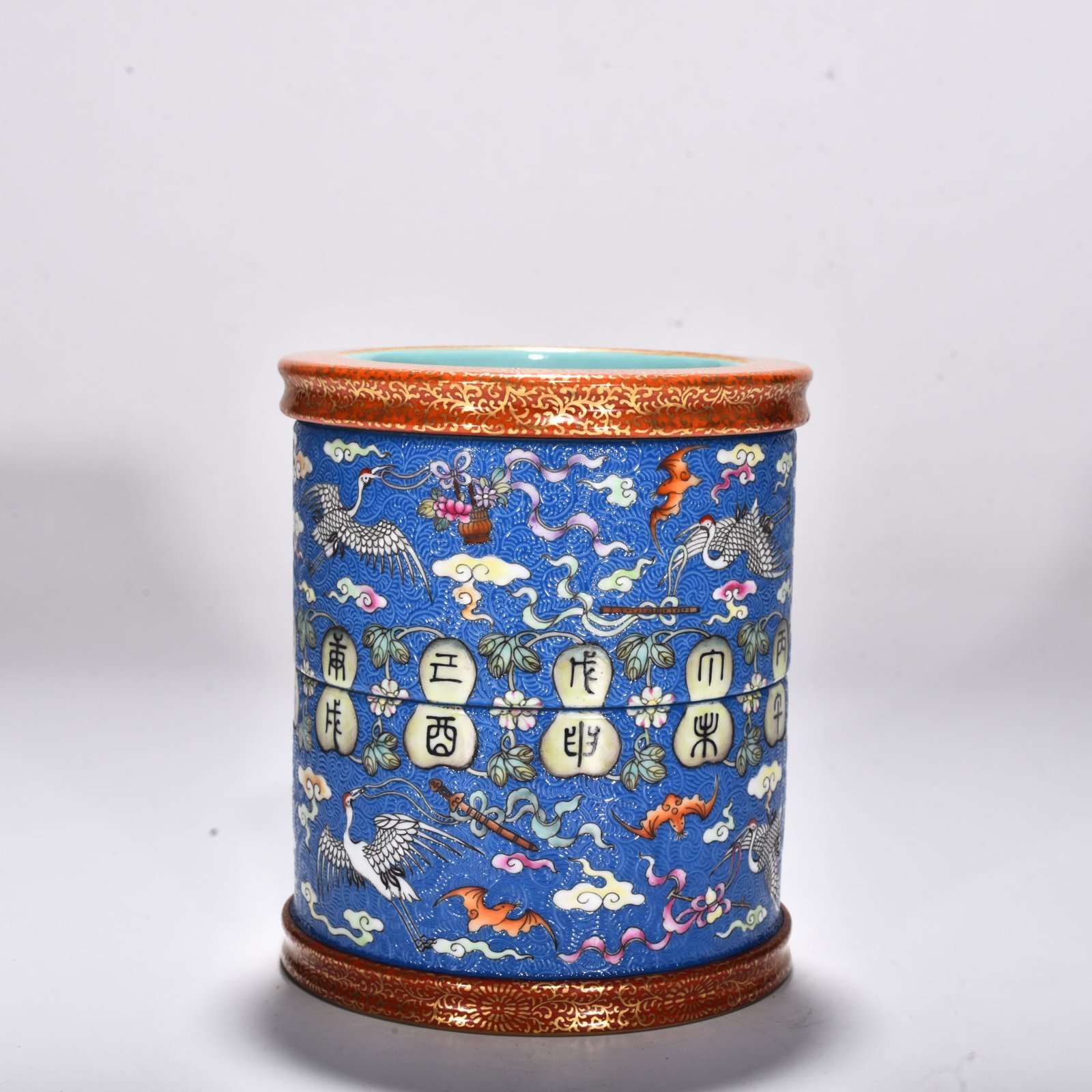 Qing Dynasty Qianlong blue ground rolled road clouds and crane pen holder