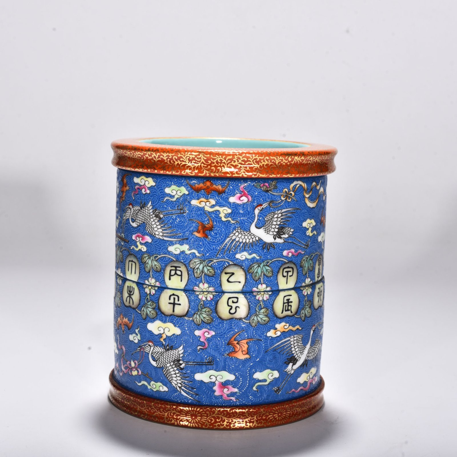 Qing Dynasty Qianlong blue ground rolled road clouds and crane pen holder