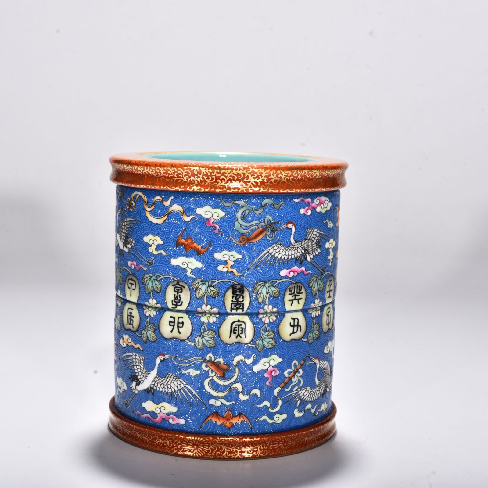 Qing Dynasty Qianlong blue ground rolled road clouds and crane pen holder