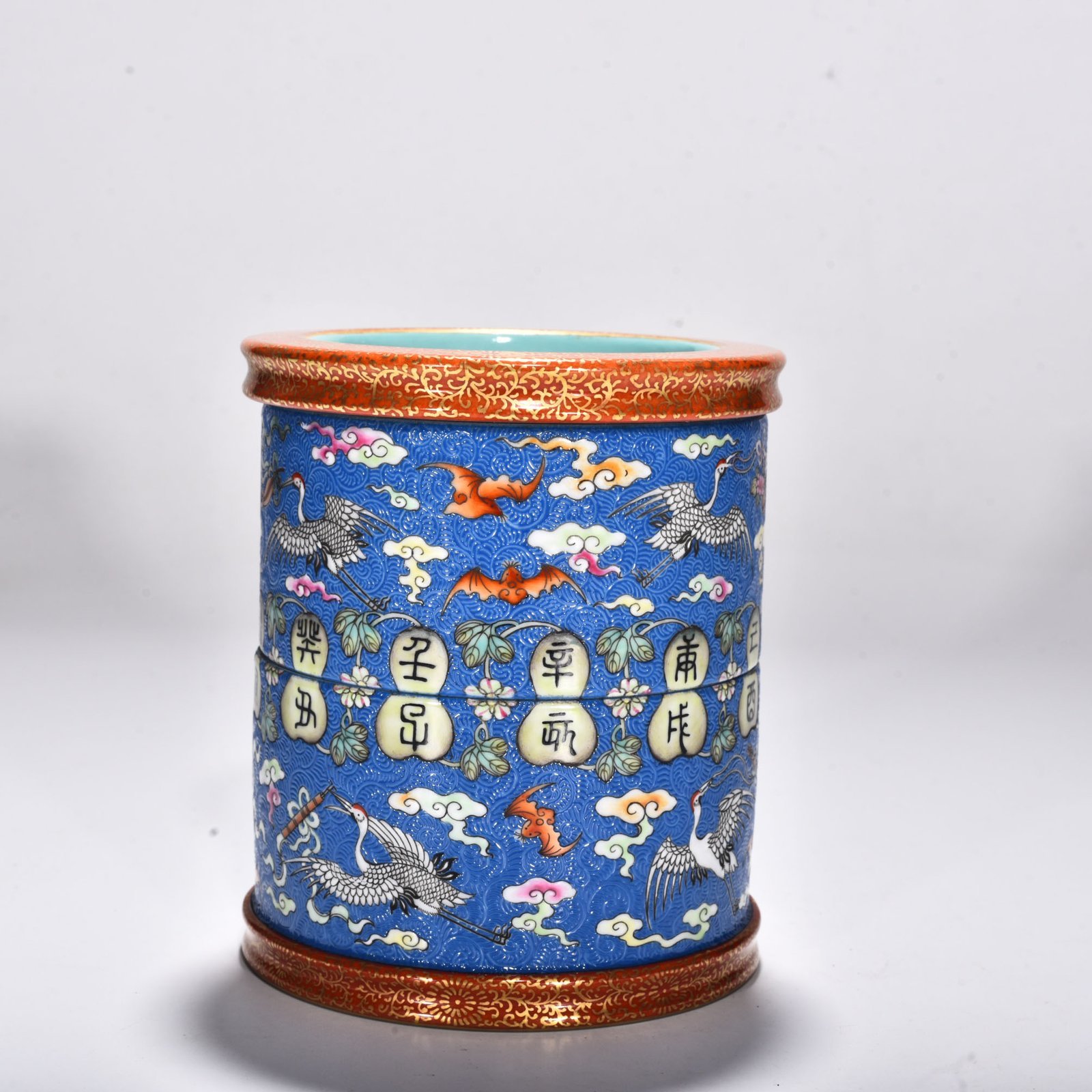 Qing Dynasty Qianlong blue ground rolled road clouds and crane pen holder