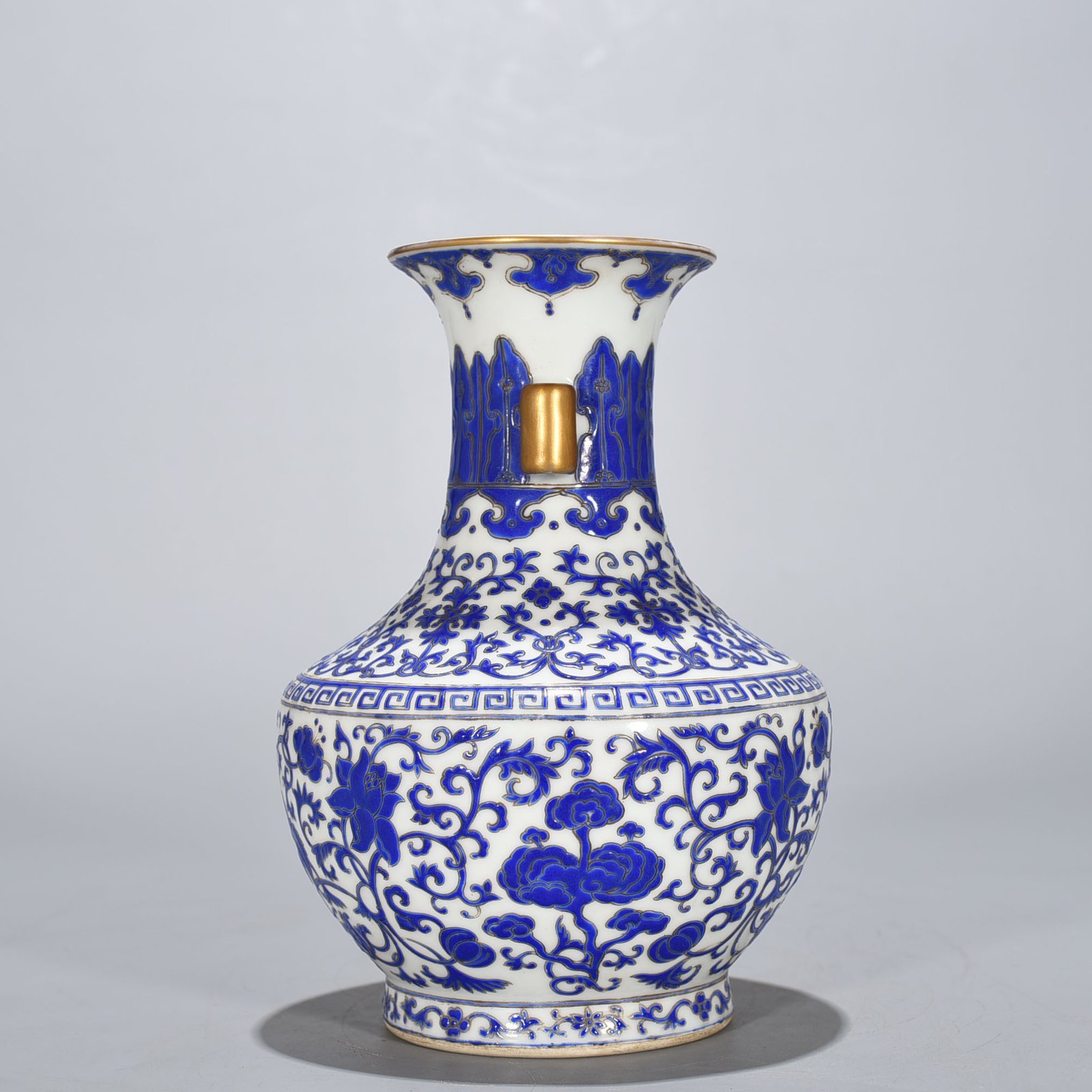 Qing Dynasty Qianlong blue with colorful intertwined branches and florals vase
