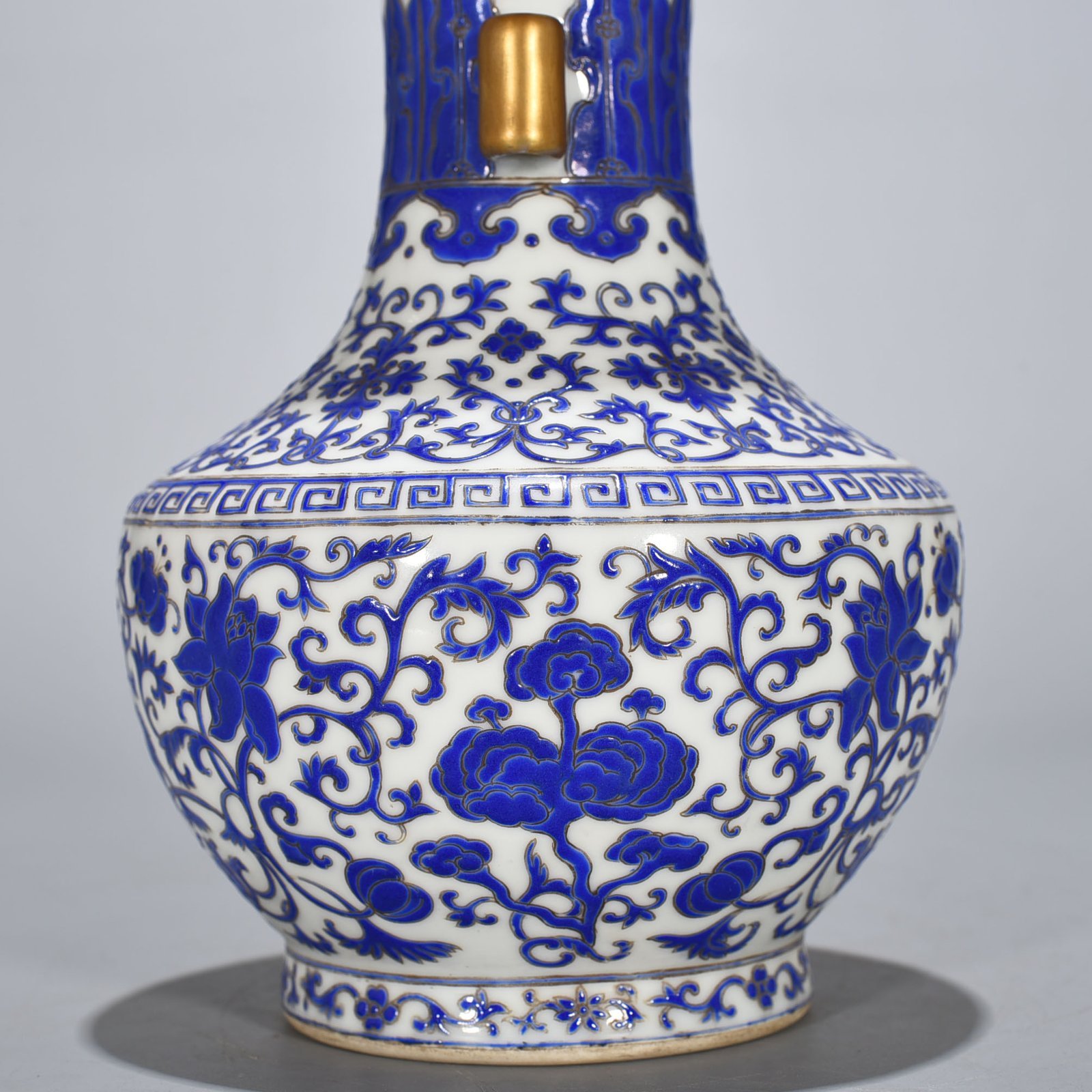 Qing Dynasty Qianlong blue with colorful intertwined branches and florals vase