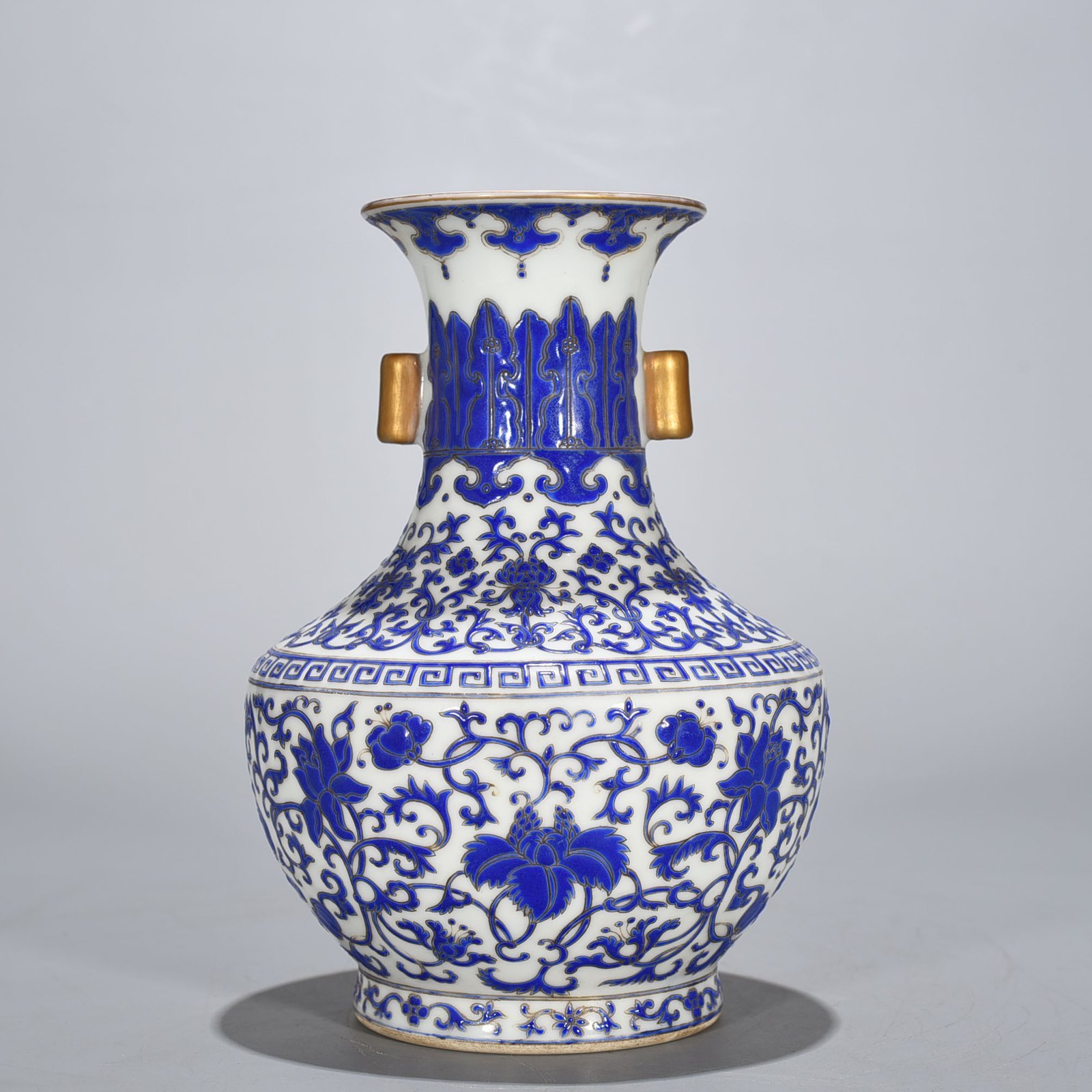 Qing Dynasty Qianlong blue with colorful intertwined branches and florals vase