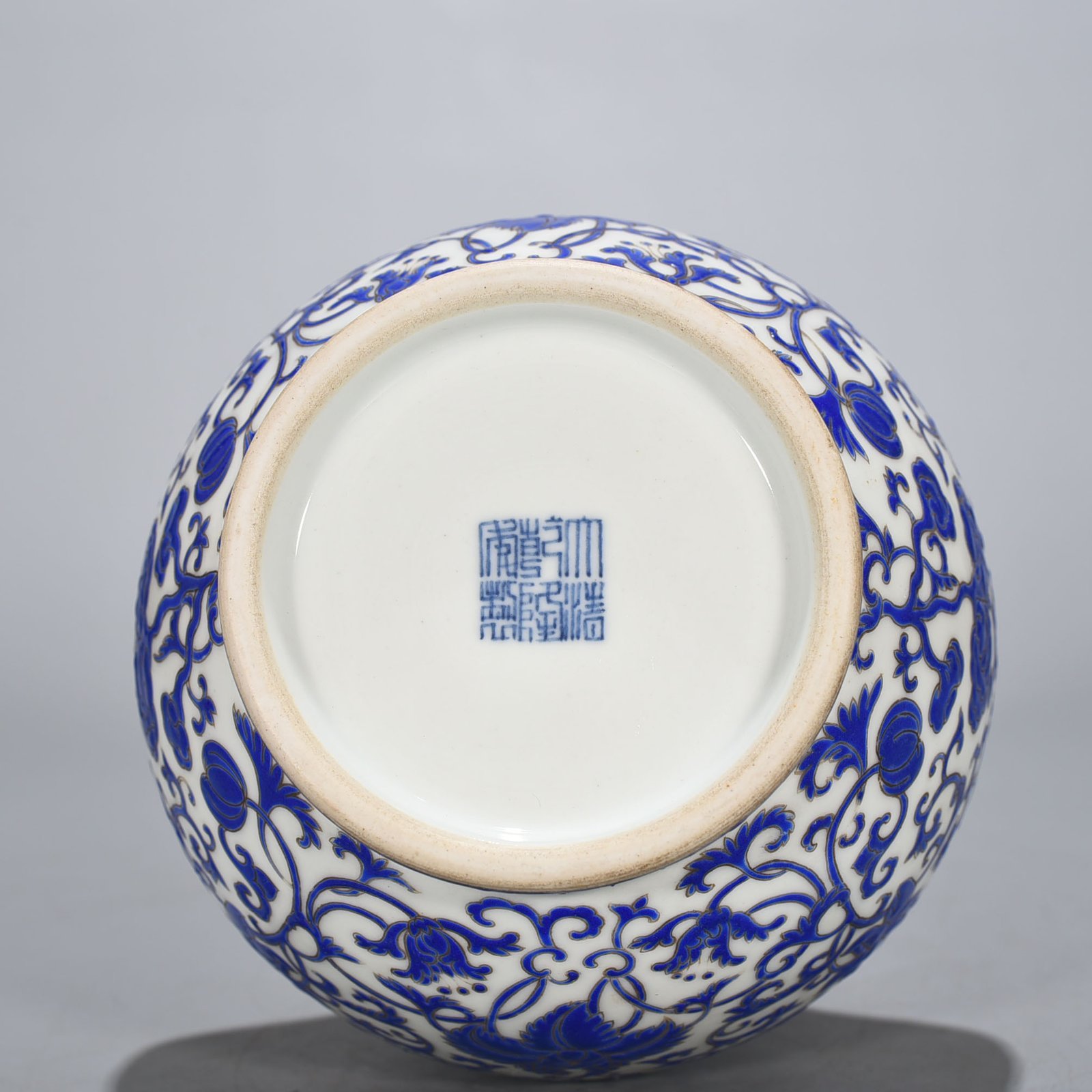 Qing Dynasty Qianlong blue with colorful intertwined branches and florals vase