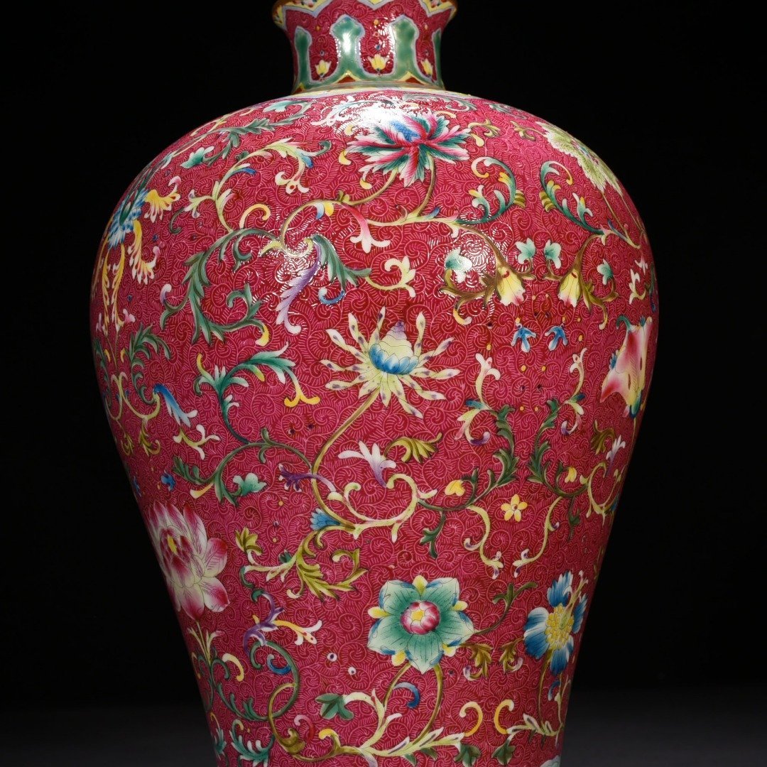 Qing Dynasty Qianlong rolling road carmine red ground pastel flower plum vase
