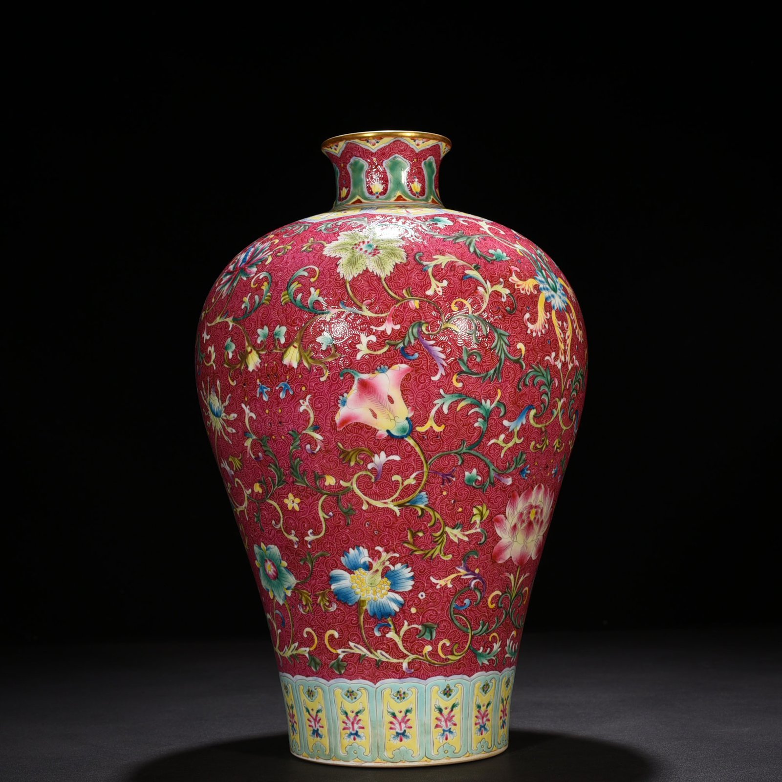 Qing Dynasty Qianlong rolling road carmine red ground pastel flower plum vase