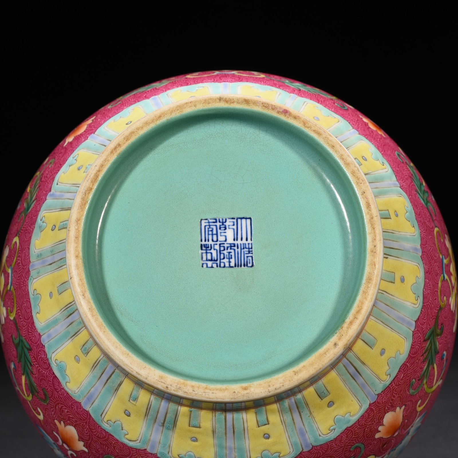 Qing Dynasty Qianlong rolling rouge ground pastel flower vase