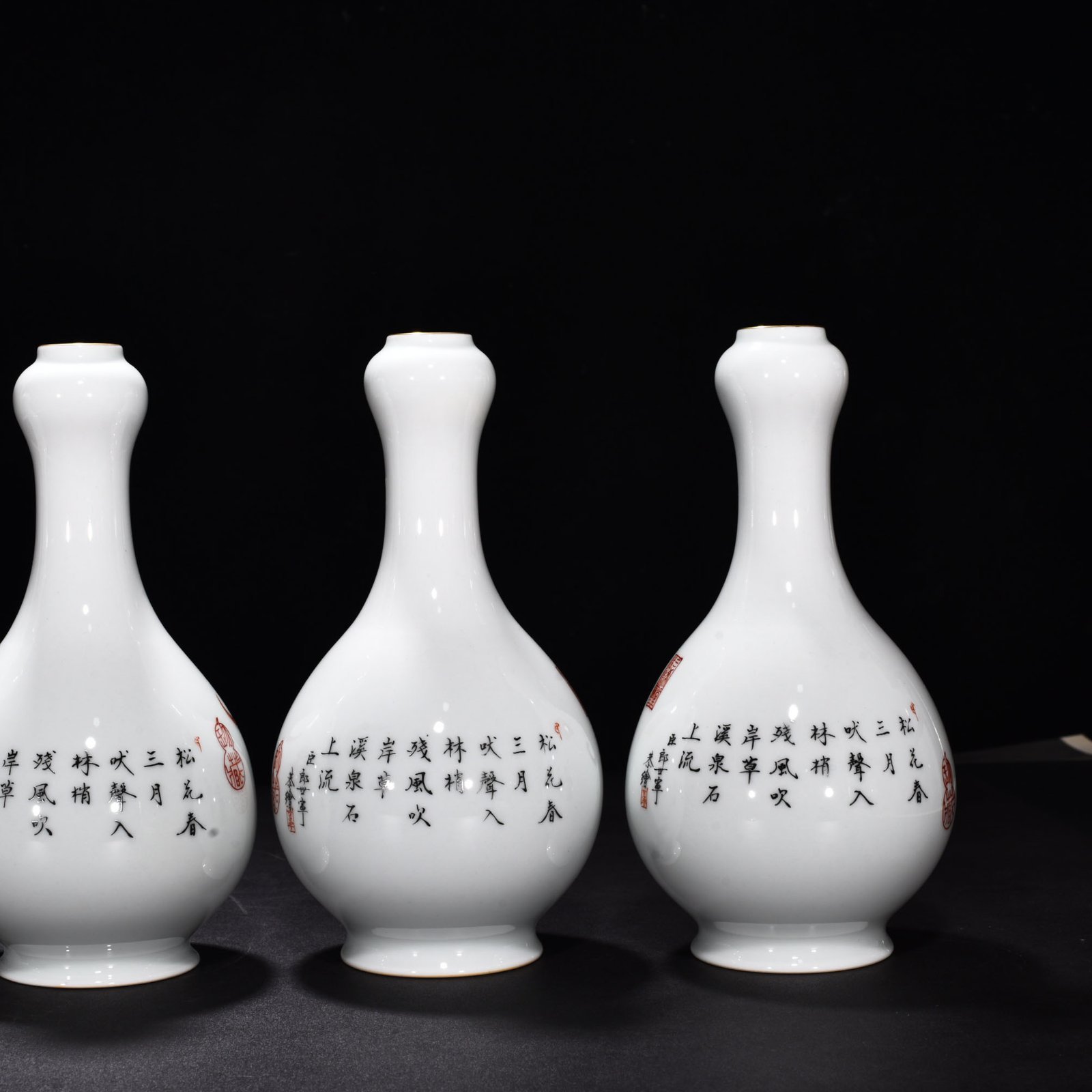 Qing Dynasty Qianlong painted enamel ten dog garlic vase