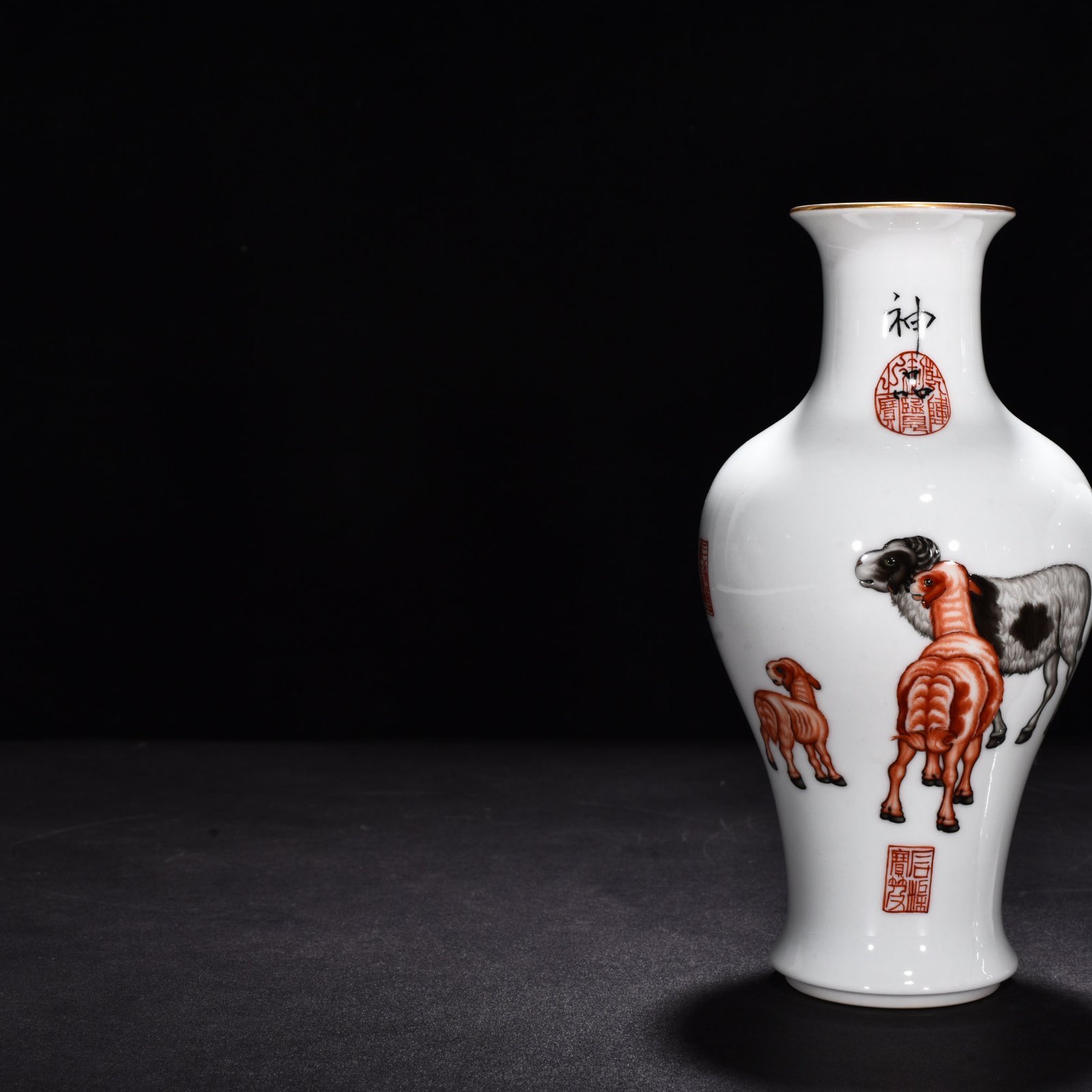 Qing Dynasty Qianlong painted enamel sheep and sheep Ruyi fish tail vase