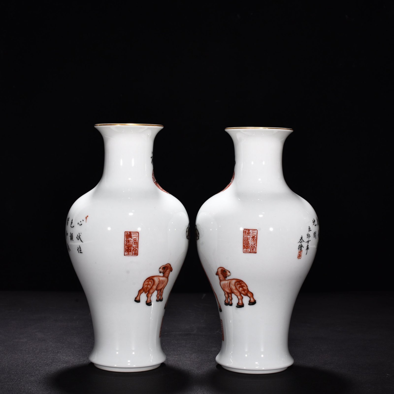 Qing Dynasty Qianlong painted enamel sheep and sheep Ruyi fish tail vase