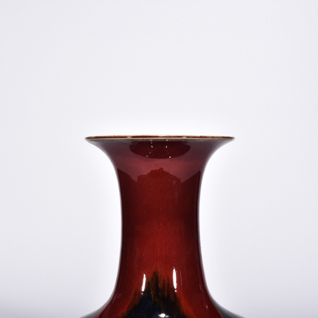 Qing Dynasty Qianlong Lang Kiln red obsidian vase with flat belly