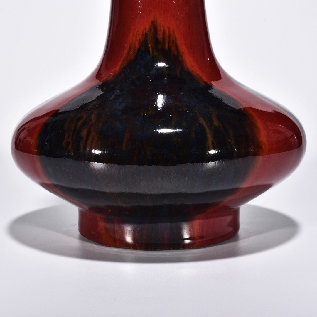 Qing Dynasty Qianlong Lang Kiln red obsidian vase with flat belly