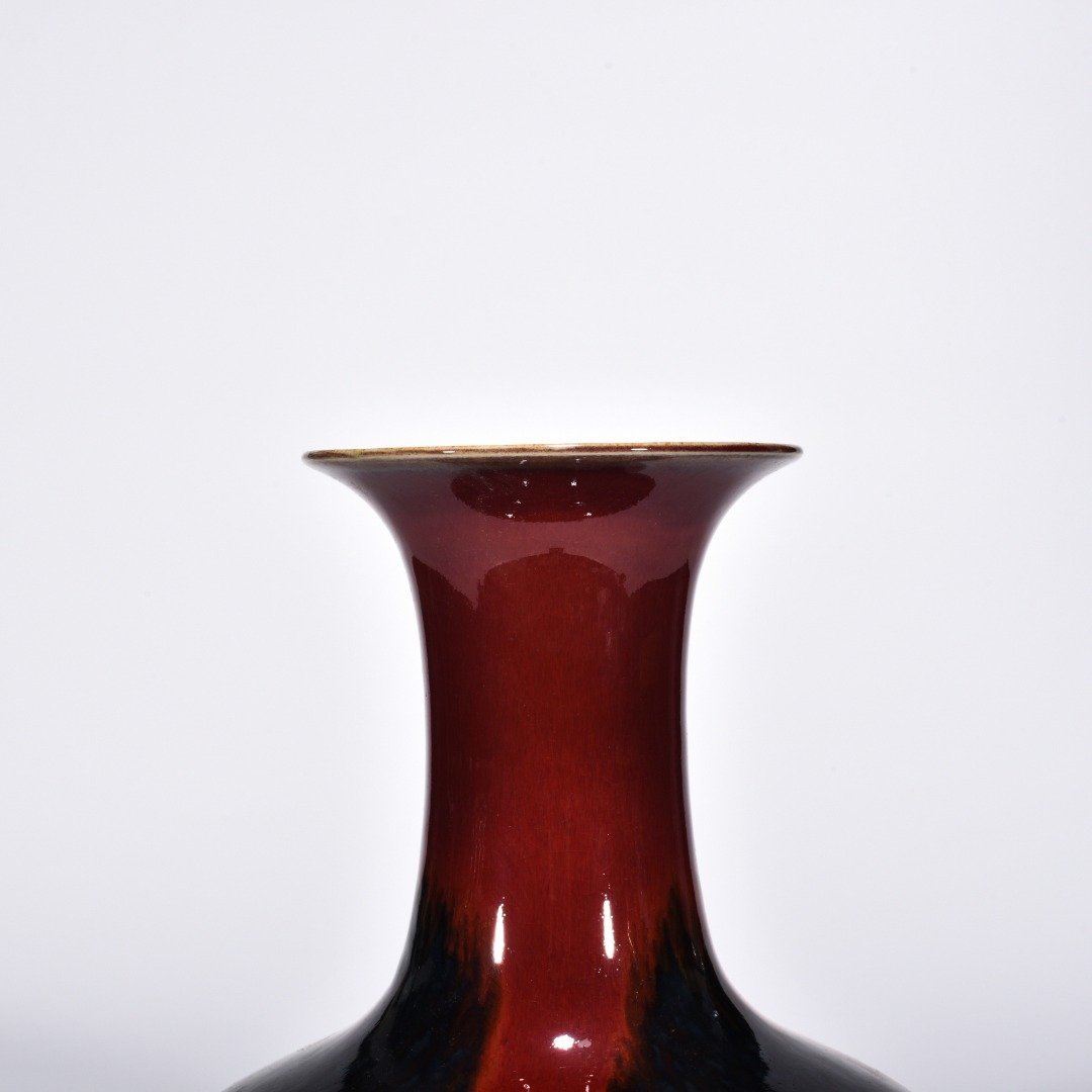Qing Dynasty Qianlong Lang Kiln red obsidian vase with flat belly