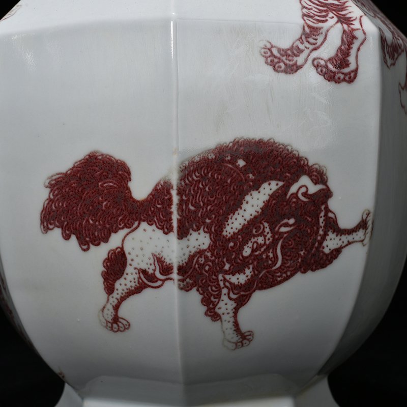 Qing Dynasty Qianlong glazed red octagonal vase with auspicious animals