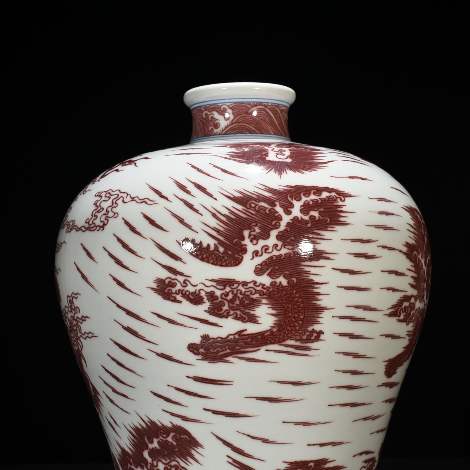 Qing Dynasty Qianlong underglaze red Canglong Jiaozi plum vase