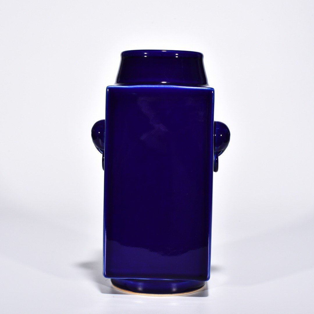Qing Dynasty Qianlong Ji blue glazed elephant ear cong style bottle