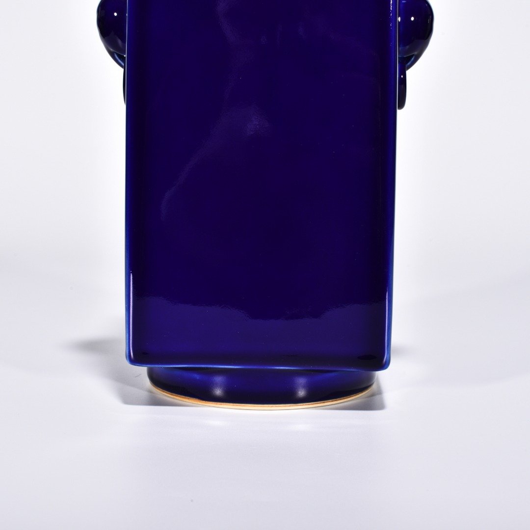 Qing Dynasty Qianlong Ji blue glazed elephant ear cong style bottle