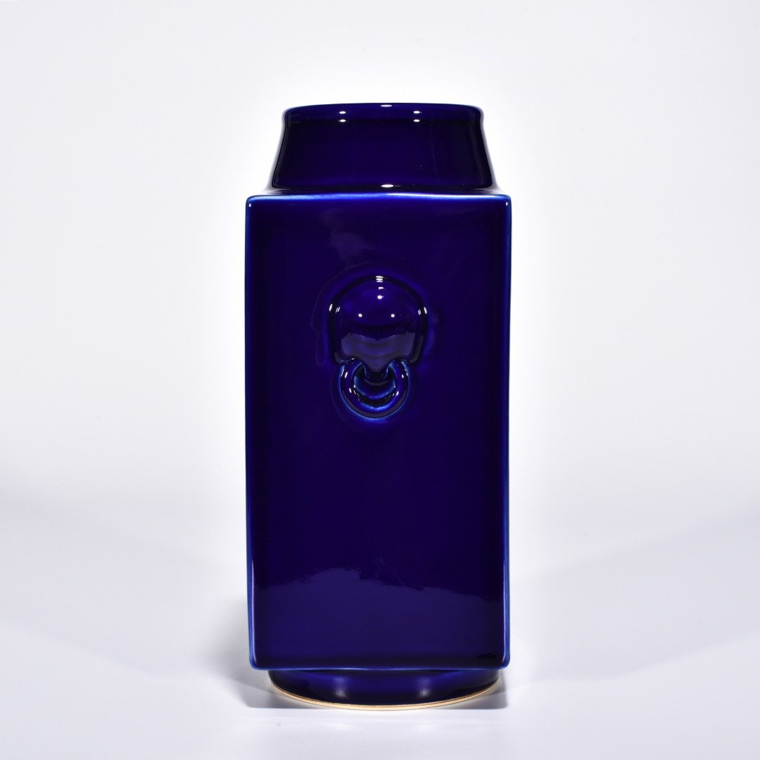 Qing Dynasty Qianlong Ji blue glazed elephant ear cong style bottle