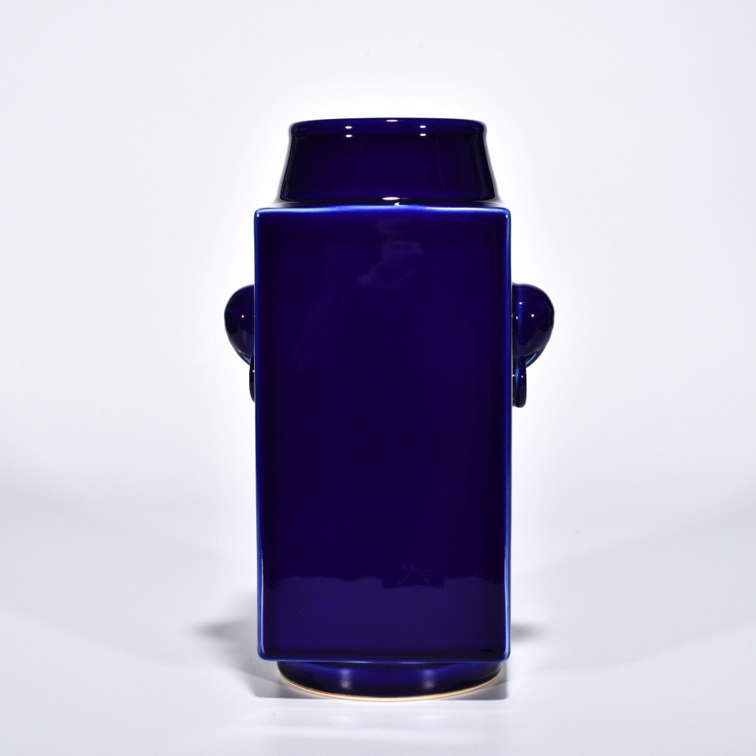 Qing Dynasty Qianlong Ji blue glazed elephant ear cong style bottle