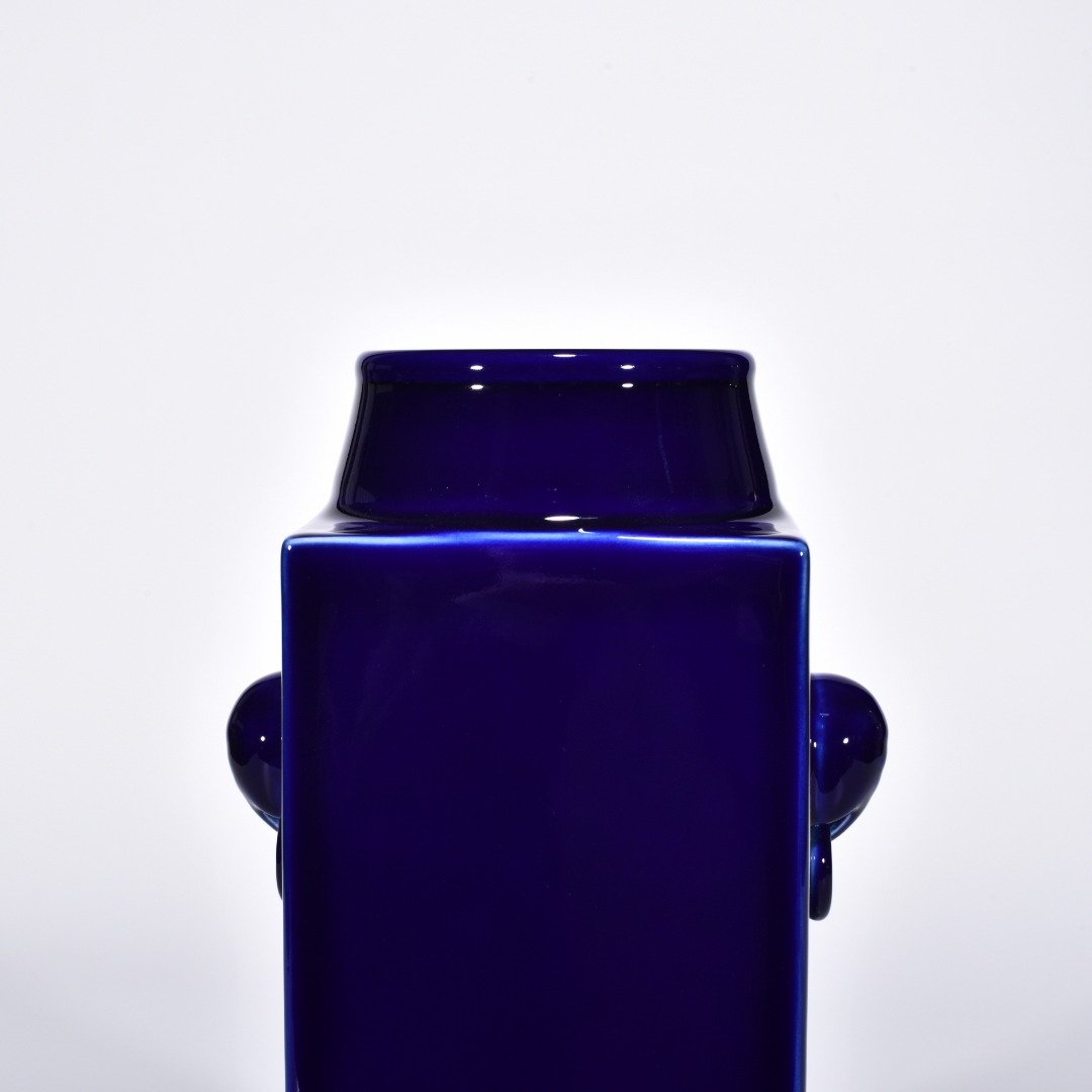 Qing Dynasty Qianlong Ji blue glazed elephant ear cong style bottle
