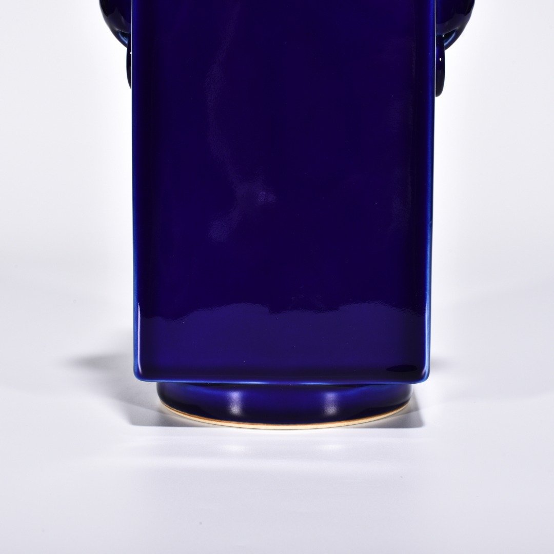 Qing Dynasty Qianlong Ji blue glazed elephant ear cong style bottle