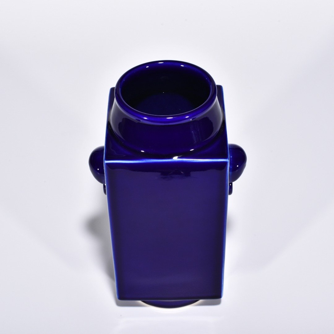 Qing Dynasty Qianlong Ji blue glazed elephant ear cong style bottle