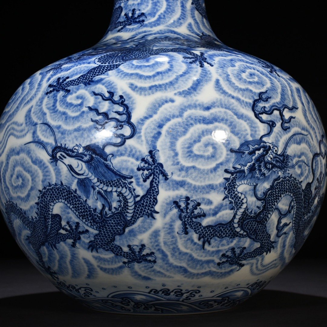Qing Dynasty Qianlong blue and white nine-dragon celestial vase