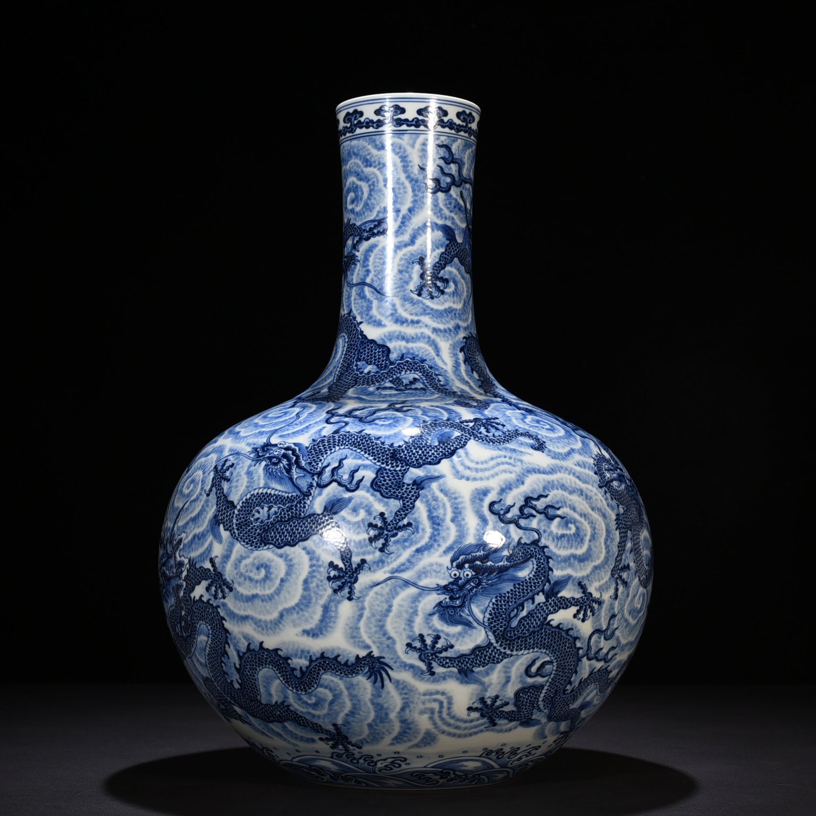 Qing Dynasty Qianlong blue and white nine-dragon celestial vase