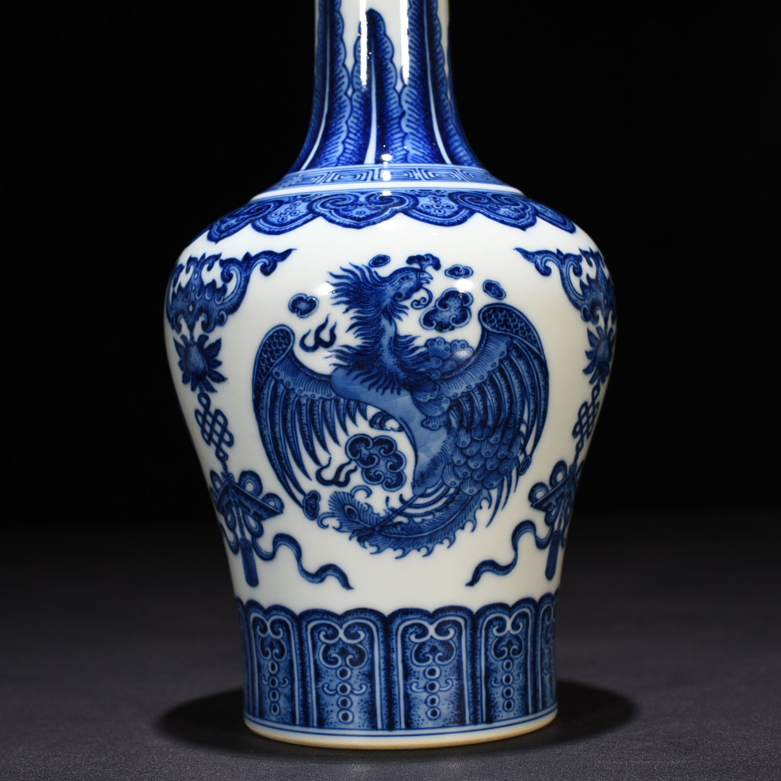 Qing Dynasty Qianlong blue and white phoenix rattle statue