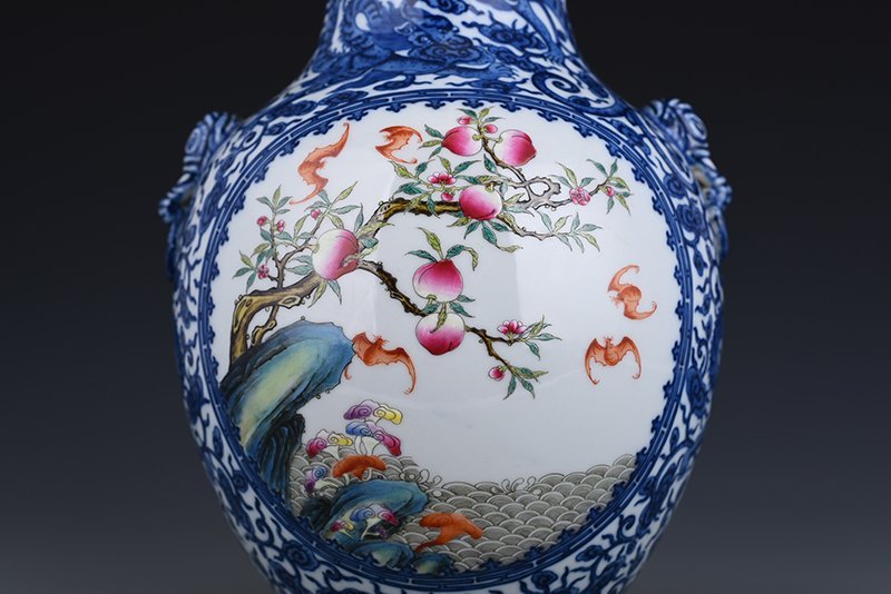 Qing Dynasty Qianlong blue and white blooming pastel pine and crane longevity ear-shaped vase