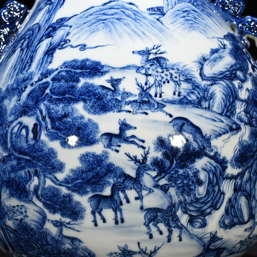 Qing Dynasty Qianlong blue and white hundred deer statue