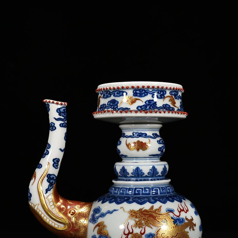 Qing Dynasty Qianlong blue and white alum red Baba teapot