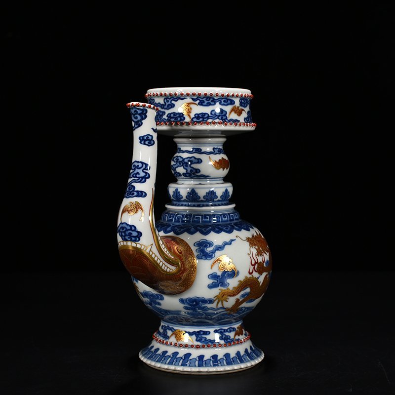 Qing Dynasty Qianlong blue and white alum red Baba teapot