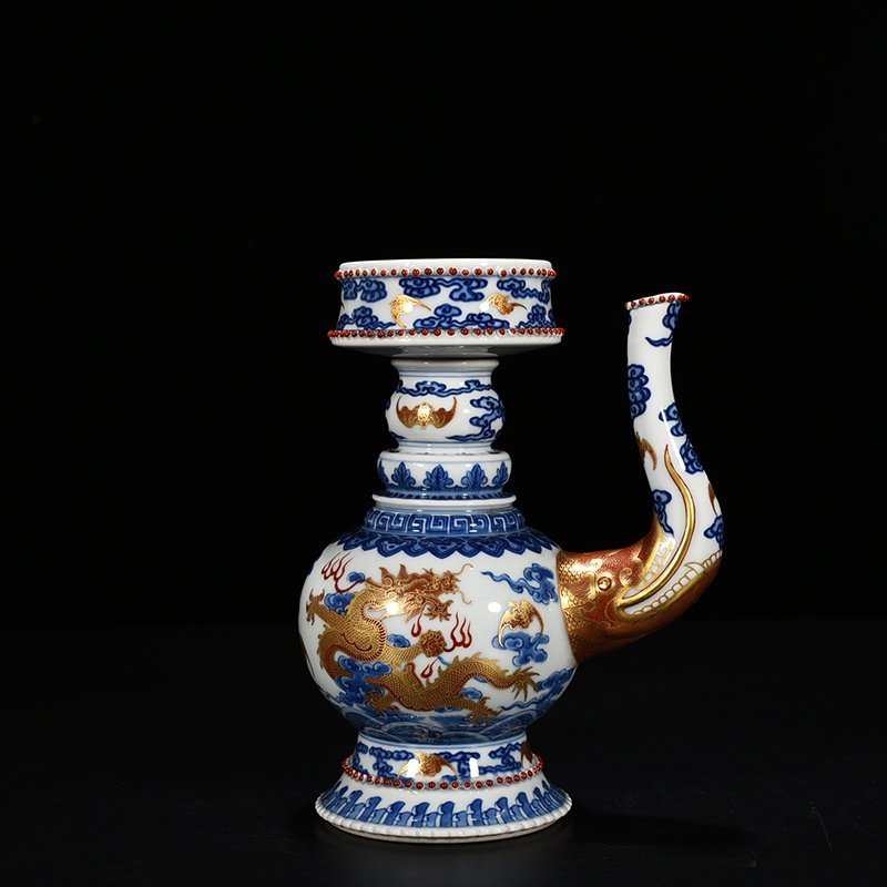 Qing Dynasty Qianlong blue and white alum red Baba teapot