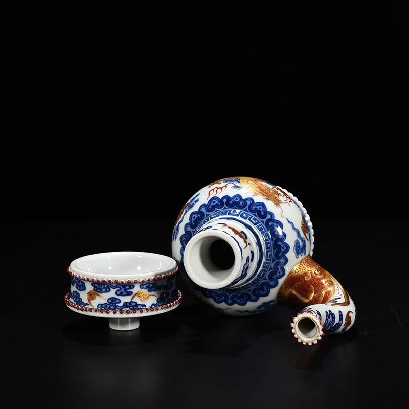 Qing Dynasty Qianlong blue and white alum red Baba teapot