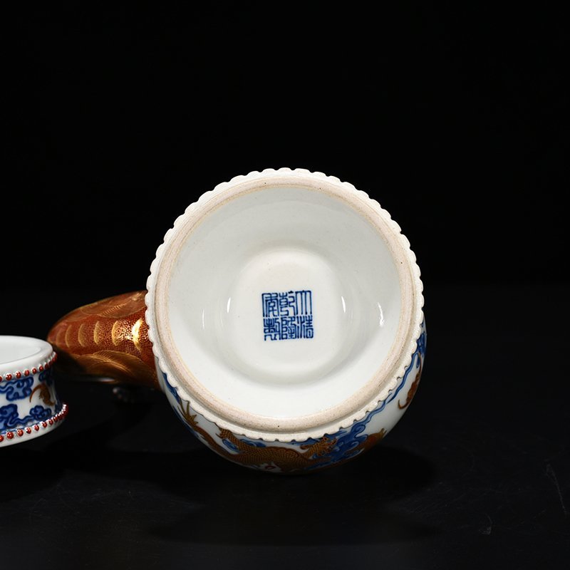 Qing Dynasty Qianlong blue and white alum red Baba teapot