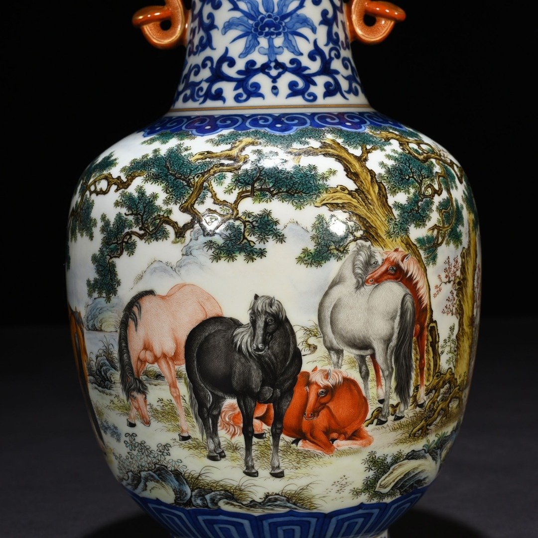 Qing Dynasty Qianlong blue and white pastel eight-horse figure Ruyi ear vase