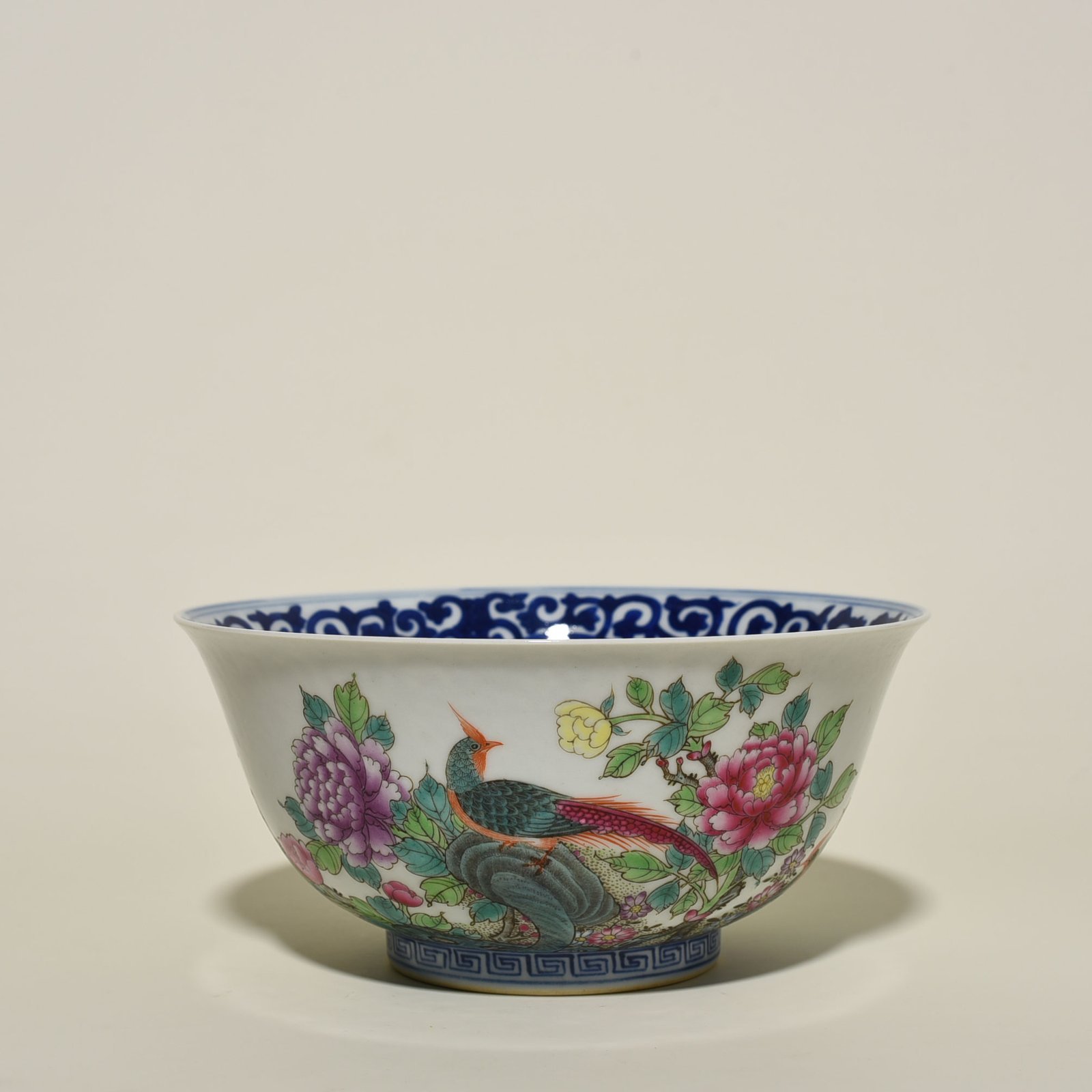 Qing Dynasty Qianlong blue and white pastel golden pheasant peony bowl